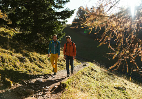 Autumn time in the Rofan Mountains. Two mountaineers are exploring the Rofan Mountains during the autumn season.