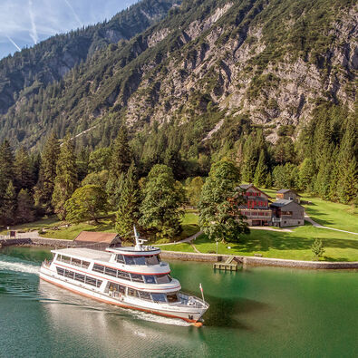 The Gaisalm at Lake Achensee The Gaisalm mountain hut is a beautiful place to stop by when hiking on the Mariensteig path from Achenkirch to Pertisau. This photo shows one of the Achensee ships leaving the jetty.