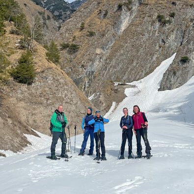 Snowshoe hikers explore the winter landscape in the Gerntal.
