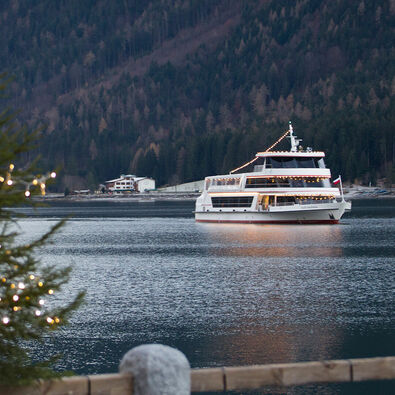 Achenseeschifffahrt in winter Exploring Lake Achensee in winter from on board the festively decorated ship.