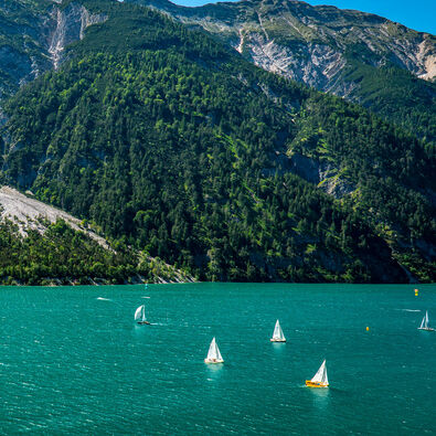 Sailing at Lake Achensee Lake Achensee offers perfect wind conditions for sailing, windsurfing and kitesurfing.