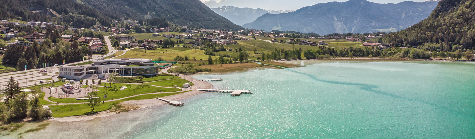 Aerial view of the Atoll Achensee in brilliant sunshine.