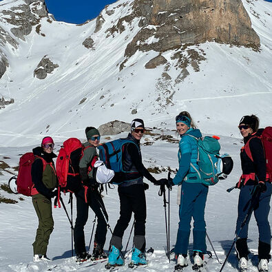 Ski touring in the Rofan mountains A small group of skiers enjoying ski touring in the Rofan mountains on a sunny day.