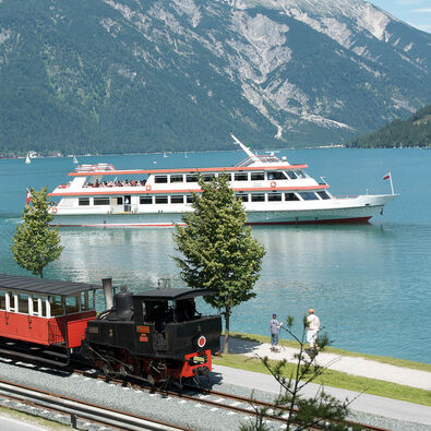 The launch of the Achenseeschifffahrt and the steam cog railway marked the beginning of tourism at Lake Achensee.