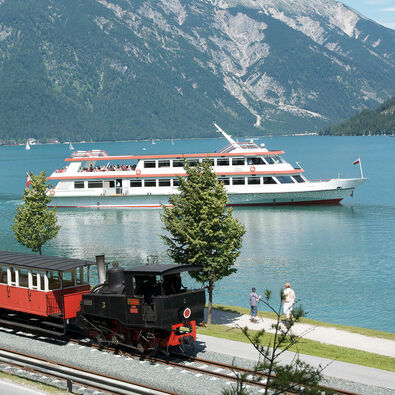 Train and ship at Lake Achensee The launch of the Achenseeschifffahrt and the steam cog railway marked the beginning of tourism at Lake Achensee.
