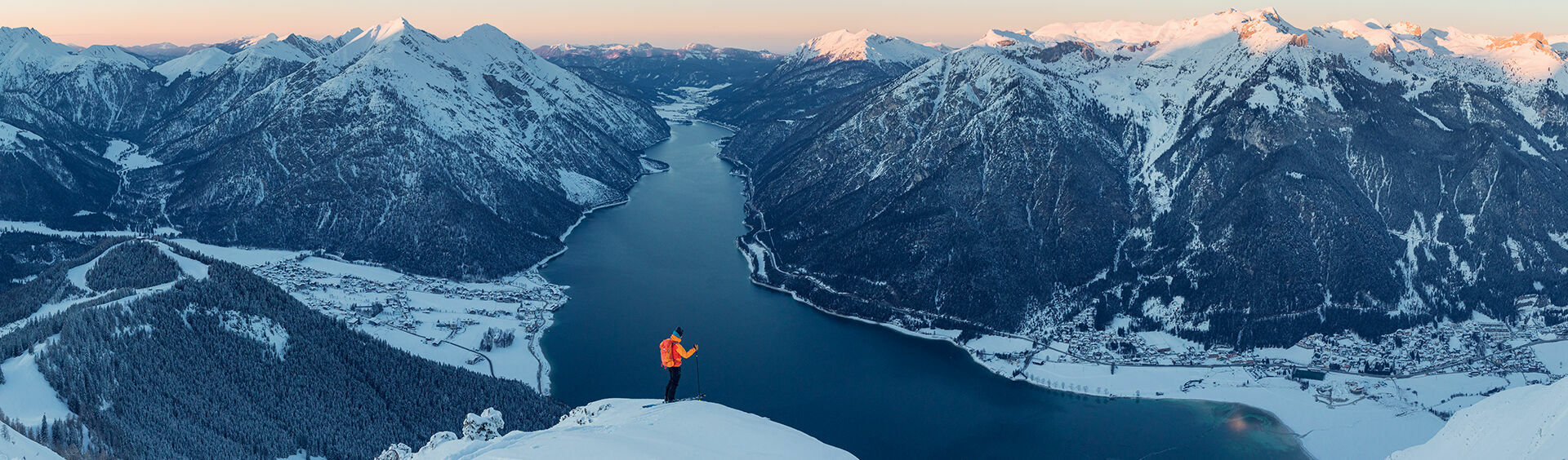 Ski tourers can explore the wintry scenery at Lake Achensee.